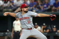 Cincinnati Reds pitcher Graham Ashcraft delivers in the first inning against the Texas Rangers in a baseball game Friday, April 26, 2024, in Arlington, Texas. (AP Photo/Richard W. Rodriguez)