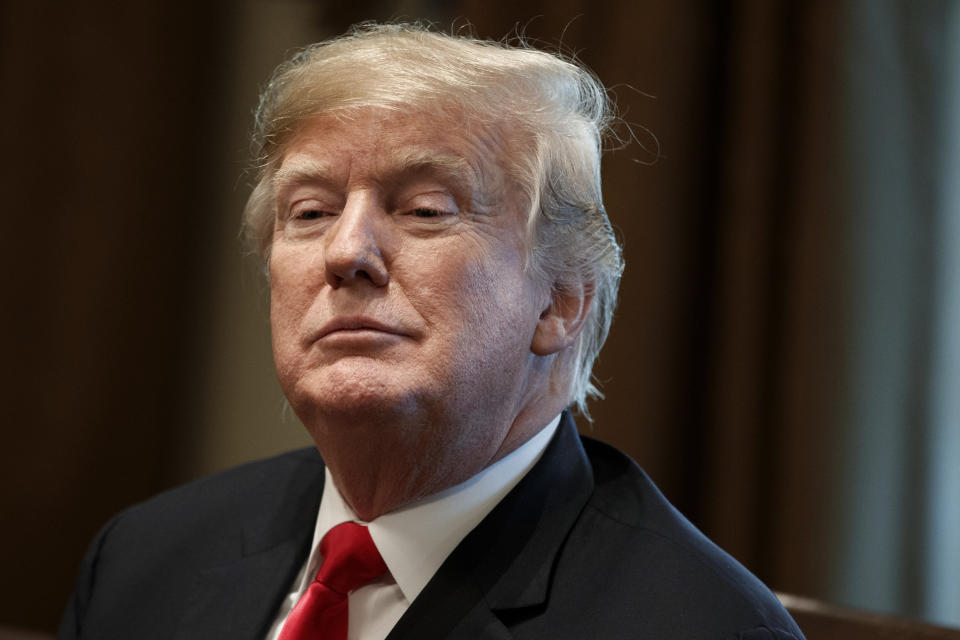 FILE - In this Dec. 13, 2018, file photo, President Donald Trump listens during a meeting in the Cabinet Room of the White House in Washington. New York Attorney General Barbara Underwood and Trump’s charitable foundation reached a deal on Tuesday, Dec. 18 to dissolve the foundation and distribute its remaining assets to other nonprofit groups. (AP Photo/Evan Vucci, File)