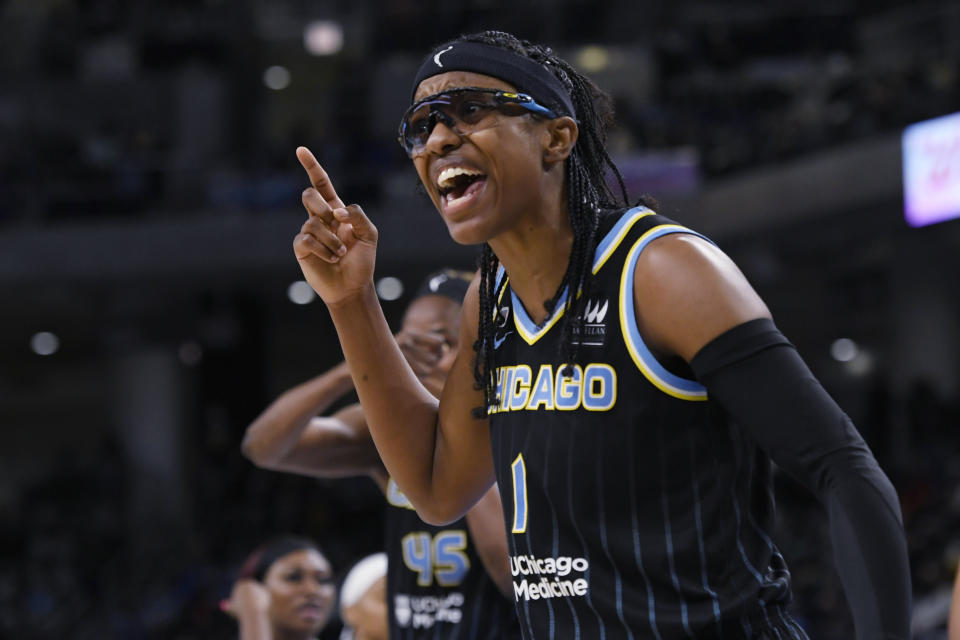 Chicago Sky's Diamond DeShields celebrates during the second half of Game 3 of the basketball team's WNBA Finals against the Phoenix Mercury on Friday, Oct. 15, 2021, in Chicago. Chicago won 86-50. (AP Photo/Paul Beaty)