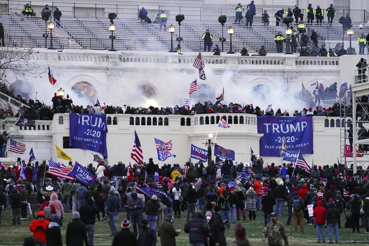 Violent protesters, loyal to President Donald Trump, storm the U.S. Capitol in Washington on Jan. 6, 2021. (John Minchillo/AP)