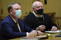 Michael Skakel, right, appears for his hearing at Stamford Superior Court, with his attorney Stephan Seeger, Friday, Oct. 30, 2020, in Stamford, Conn. A Connecticut prosecutor says Kennedy cousin Michael Skakel will not face a second trial in the 1975 murder of teenager Martha Moxley in Greenwich. (Erik Trautmann/Hearst Connecticut Media via AP, Pool)