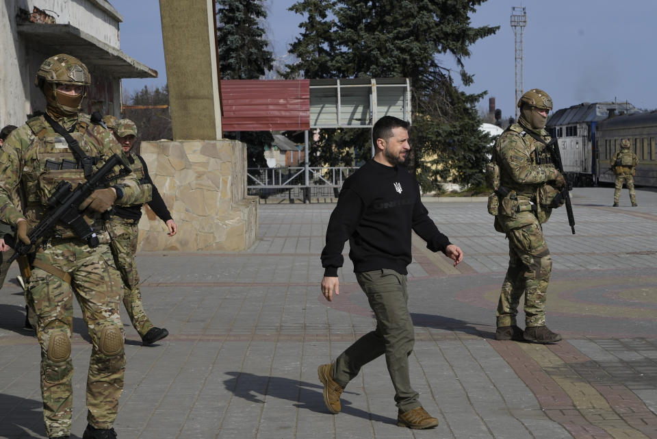 Ukrainian President Volodymyr Zelenskyy arrives at the train station in Trostianets in the Sumy region of Ukraine, Tuesday March 28, 2023. Zelenskyy has been increasing his travel across Ukraine as his country's war with Russia enters its second year. (AP Photo/Efrem Lukatsky)