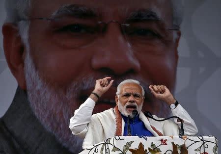 Prime Minister Narendra Modi addresses a rally in a cricket stadium in Srinagar, November 7, 2015. REUTERS/Danish Ismail