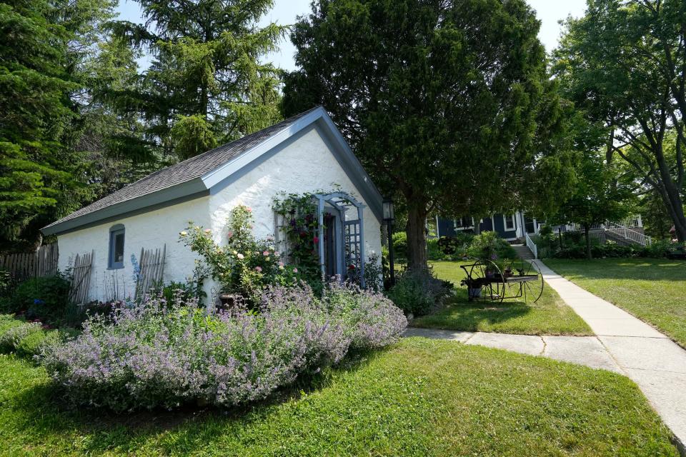 A summer kitchen home is seen on the property of Susan and Tom Felmer in Cedarburg on June 22, 2023. The Felmers use the space as a potting shed for their garden.