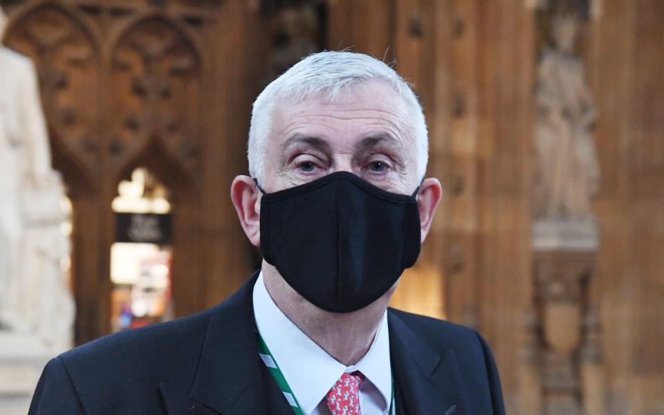  Keep it covered: Speaker urges parliamentary passholders to wear masks, , The Speaker lead his procession into the Chamber today wearing a face covering for the first time ever – to encourage everyone in Parliament to keep themselves safe from Covid-19. , , , , Sir Lindsay Hoyle said the best way to encourage MPs and staff to wear face coverings when moving around the parliamentary estate “was to lead by example”. , , , , On the advice of Public Health England, the House of Commons Commission has asked all parliamentary passholders to wear face coverings when they are walking between buildings or queuing for food and drink in catering outlets. , , , , “Just as we have all had to wear them in supermarkets and on public transport, it makes sense that we all wear face coverings to protect each other on the estate,” he said. , , , , Staff and MPs are not expected to wear face coverings in meetings or when working in their offices. While Members are not expected to wear face coverings in the Chamber, they have been advised to wear them in the lobbies during a division. - JESSICA TAYLOR