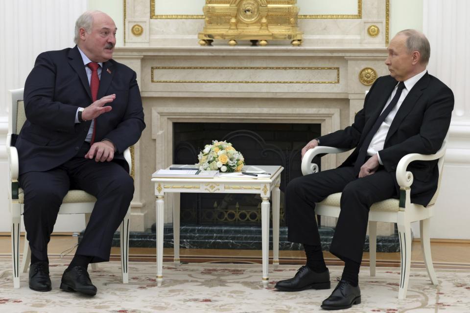 Russian President Vladimir Putin, right, listens to Belarus President Alexander Lukashenko during their meeting at the Kremlin in Moscow, Russia, Thursday, April 11, 2024. (Gavriil Grigorov, Sputnik, Kremlin Pool Photo via AP)