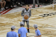 Trae Young of the Atlanta Hawks warms up during an NBA All-Star basketball game practice Saturday, Feb. 15, 2020, in Chicago. (AP Photo/David Banks)