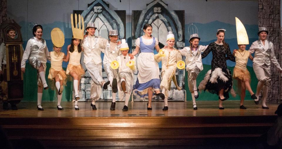 The "kick line" from Cape Cod Kids on Broadway's production of "Beauty and the Beast."