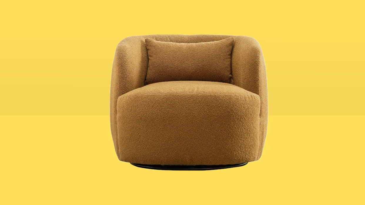 a tan chair against a yellow background