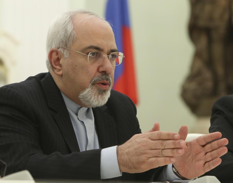 Iranian Foreign Minister Mohammad Javad Zarif speaks at his meeting with Russian President Vladimir Putin in the Kremlin in Moscow, Russia, Thursday, Jan. 16, 2014. Putin credited Tehran for the success of international talks on the Iranian nuclear program and called for boosting Russian-Iranian trade. (AP Photo/Sergei Karpukhin, Pool)