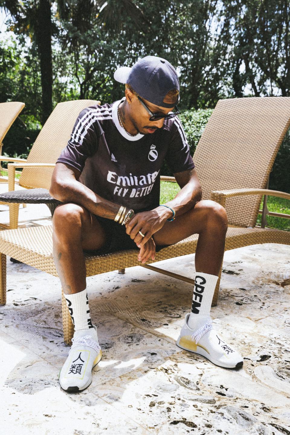 Lounging in a Real Madrid jersey.