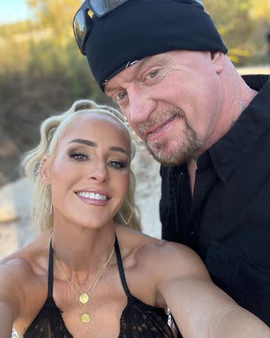 <p>Michelle McCool Instagram</p> The Undertaker and Michelle McCool take a selfie in 2023