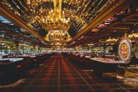 <p>Atlantic City was booming in the 1980s, and its hotels and casinos all featured over-the-top, somewhat garish decor. This photograph shows the casino at the Golden Nugget, which, appropriately, has quite a few gold elements.</p>