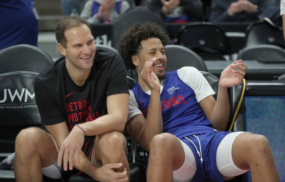 Detroit Pistons forward Bojan Bogdanovic, left, and guard Cade Cunningham watch rookies perform after open practice held for fans at Little Caesars Arena, Sunday, Oct. 15. 2023.
