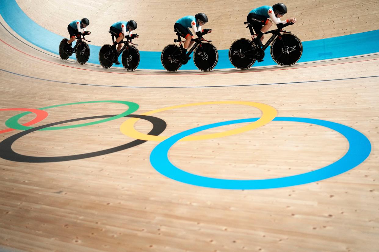 Team Canada competes during the track cycling women's team pursuit at the 2020 Summer Olympics, Monday, Aug. 2, 2021, in Izu, Japan.