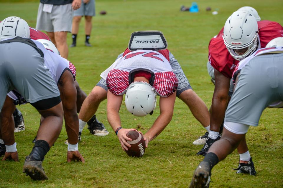 Troy University long snapper Cameron Kaye prepares for a snap during a practice earlier this season. Kaye, a redshirt junior, has been the starting long snapper at Troy for three years.
