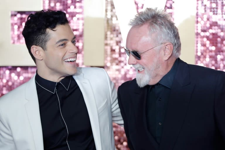 US actor Rami Malek (L) poses on the red carpet with Queen drummer Roger Taylor at the world premiere of the film 'Bohemian Rhapsody'