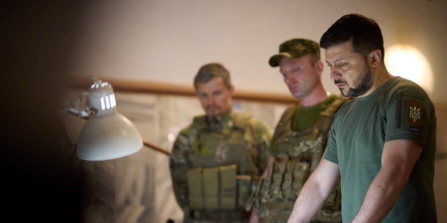 Volodymyr Zelenskyy and Ukrainian soldiers