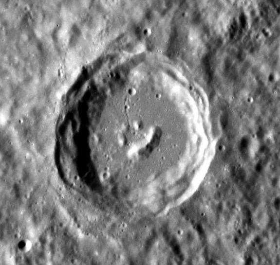 The central peaks of this complex crater on Mercury formed in such a way that it resembles a smiling face. This image was taken by NASA's Messenger spacecraft.