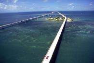 <p><strong>The Drive: </strong><a href="https://www.tripadvisor.com/Attraction_Review-g34345-d109832-Reviews-The_Overseas_Highway-Key_West_Florida_Keys_Florida.html" rel="nofollow noopener" target="_blank" data-ylk="slk:Overseas Highway;elm:context_link;itc:0;sec:content-canvas" class="link ">Overseas Highway</a></p><p><strong>The Scene:</strong> Driving over the blue-green waters of the Atlantic between the cities of <a href="https://www.tripadvisor.com/Tourism-g34438-Miami_Florida-Vacations.html" rel="nofollow noopener" target="_blank" data-ylk="slk:Miami;elm:context_link;itc:0;sec:content-canvas" class="link ">Miami</a> and <a href="https://www.tripadvisor.com/Attraction_Products-g34345-Key_West_Florida_Keys_Florida.html" rel="nofollow noopener" target="_blank" data-ylk="slk:Key West;elm:context_link;itc:0;sec:content-canvas" class="link ">Key West</a>, the Overseas Highway provides a once-in-a-lifetime experience. Pick an off-season time to avoid a traffic jam, and it'll be smooth sailing for 113 miles. </p><p><strong>The Pit-Stop:</strong> Visit <a href="https://www.tripadvisor.com/Hotel_Review-g34344-d218568-Reviews-Jules_Undersea_Lodge-Key_Largo_Florida_Keys_Florida.html" rel="nofollow noopener" target="_blank" data-ylk="slk:Jules' Undersea Lodge;elm:context_link;itc:0;sec:content-canvas" class="link ">Jules' Undersea Lodge</a> (or stay the night!), the world's only underwater hotel. </p>