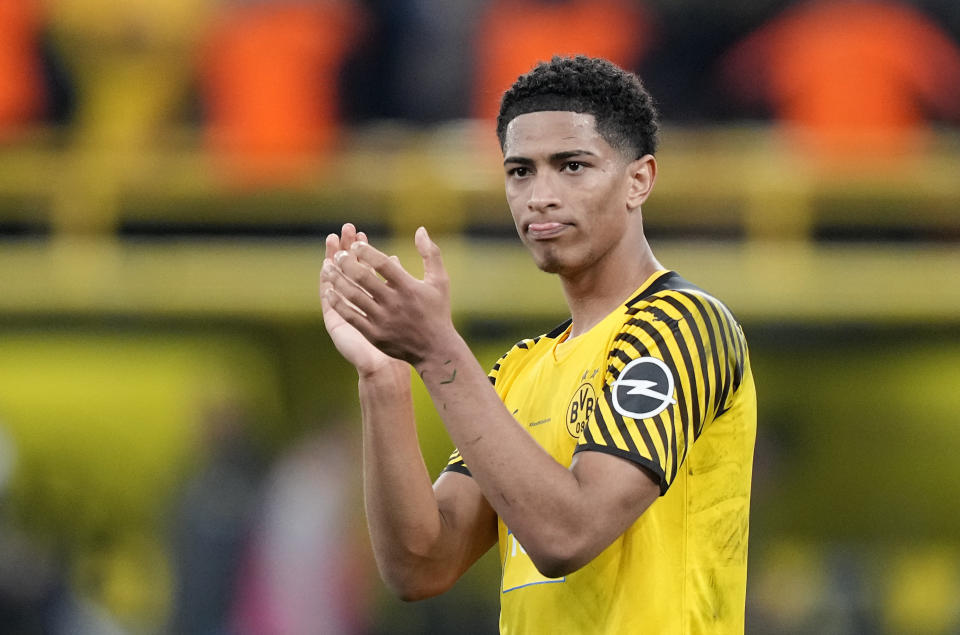 FILE - Dortmund's Jude Bellingham claps hands after winning the German Bundesliga soccer match between Borussia Dortmund and Arminia Bielefeld in Dortmund, Germany, on March 13, 2022. (AP Photo/Martin Meissner, File)