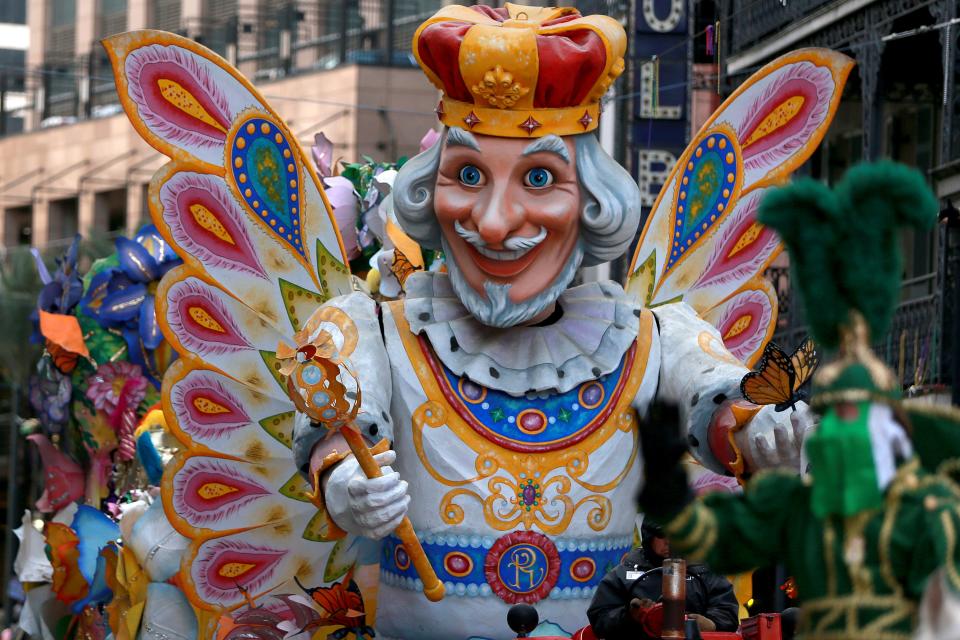 Members of the Krewe of Rex King of Carnival parade down St. Charles Avenue on Mardi Gras Day on March 5, 2019, in New Orleans, Louisiana.