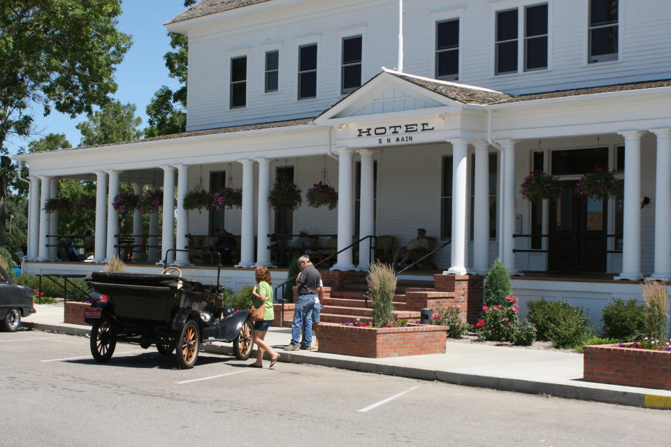 This July 23, 2011 photo released by Ron Zellar shows the recently rehabilitated Sacajawea Hotel in Three Forks, Mont. The hotel and town make an appealing stop on a road trip between Yellowstone and Glacier national parks. (AP Photo/Ron Zellar)