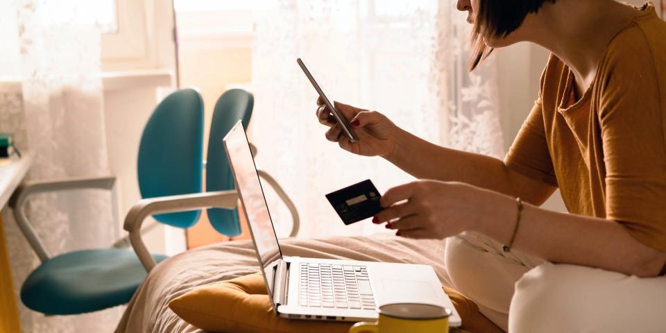 woman shopping online using laptop