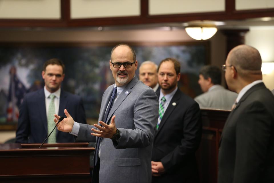 University of West Florida head football coach Pete Shinnick speaks to his team and others as they visit the state Capitol Wednesday, Feb. 19, 2020 in recognition of the team's 2019 NCAA Division II national championship. UWF won the title in its fourth season of football, defeating Minnesota State 48-40 on Dec. 21, 2019, in McKinney, Texas.