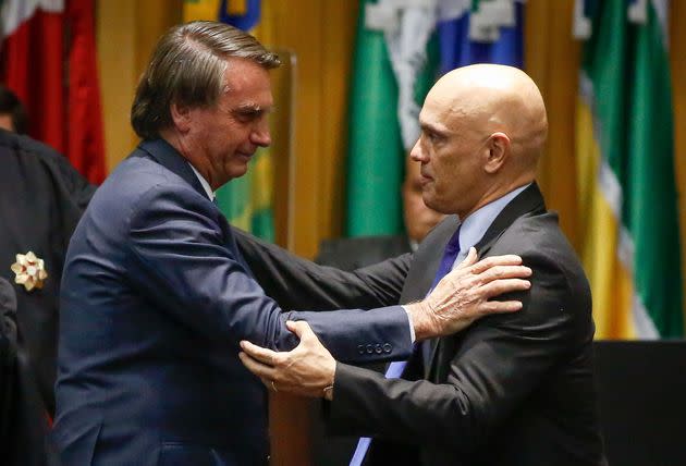 Supreme Court Justice Alexandre de Moraes, right, the head of Brazil's top electoral court, has fervently defended the country's election system from Jair Bolsonaro's attacks, insisting that it is clean, transparent and reliable. (Photo: Sergio Lima via Getty Images)