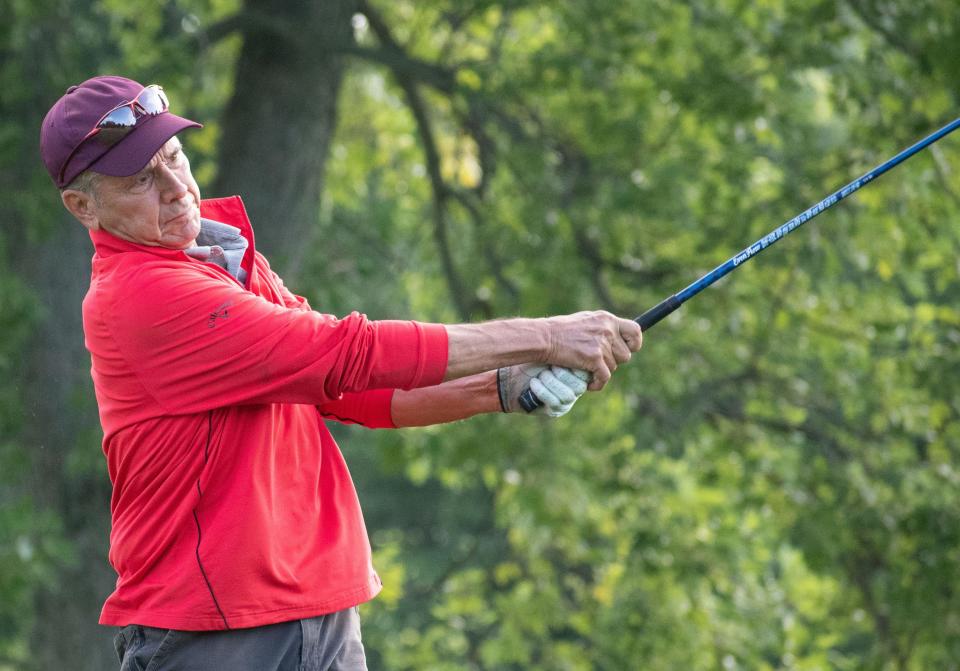 Dan Neubecker tees off the second hole at Cascades Golf Course in the Bloomington City Golf Tournament on July 9, 2023.