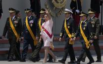 Peru's new President Dina Boluarte attends a ceremony marking Amy Day in Lima, Peru, Friday, Dec. 9, 2022. Peru's Congress voted to remove President Pedro Castillo from office Wednesday and replace him with the vice president, Boluarte, shortly after Castillo tried to dissolve the legislature ahead of a scheduled vote to remove him. (AP Photo/Martin Mejia)