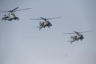 Air Force helicopters flyover Rajpath during the Republic Day parade in New Delhi on January 26, 2021. (Photo by Jewel SAMAD / AFP) (Photo by JEWEL SAMAD/AFP via Getty Images)