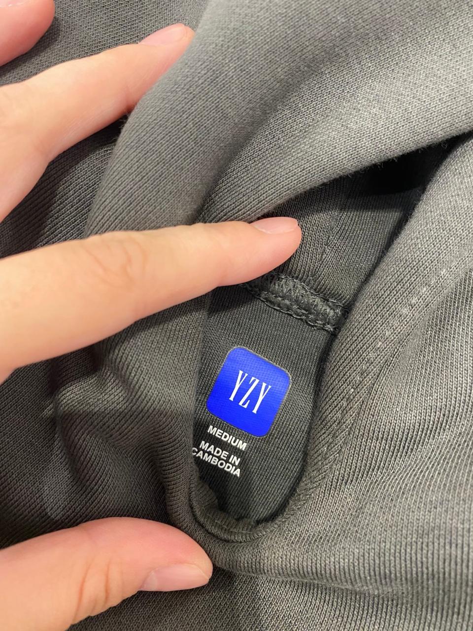 A Yeezy tag on a Gap sweatshirt in August 2022.