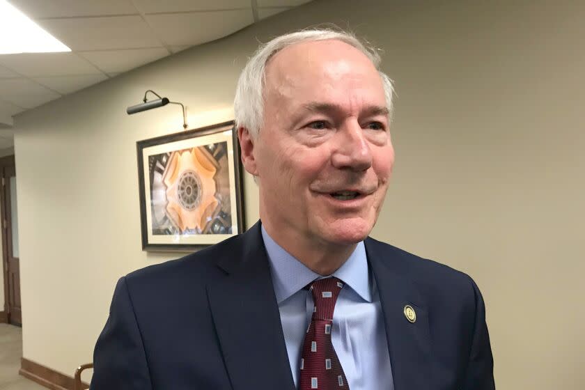 FILE - In this Jan. 13, 2020, file photo, Arkansas Gov. Asa Hutchinson speaks to reporters in Little Rock, Ark. Hutchinson on Tuesday, March 9, 2021, signed into law legislation banning nearly all abortions in the state, a sweeping measure that supporters hope will force the U.S. Supreme Court to revisit its landmark Roe v. Wade decision but opponents vow to block before it takes effect later this year. (AP Photo/Andrew Demillo, File)