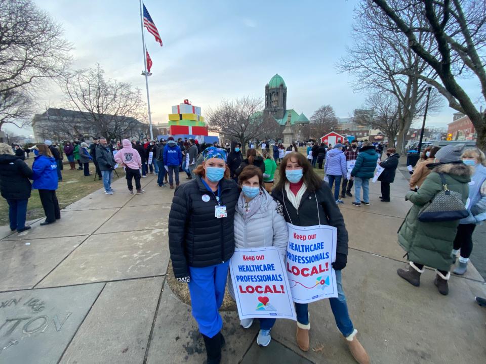 From left: Morton Hospital registered nurses Allison Gomes, Debbie Nearhoof and Gina Tardo participate in a Massachusetts Nurses Association rally for Morton Hospital nurses on Thursday, Jan. 13, 2022 on Taunton Green.