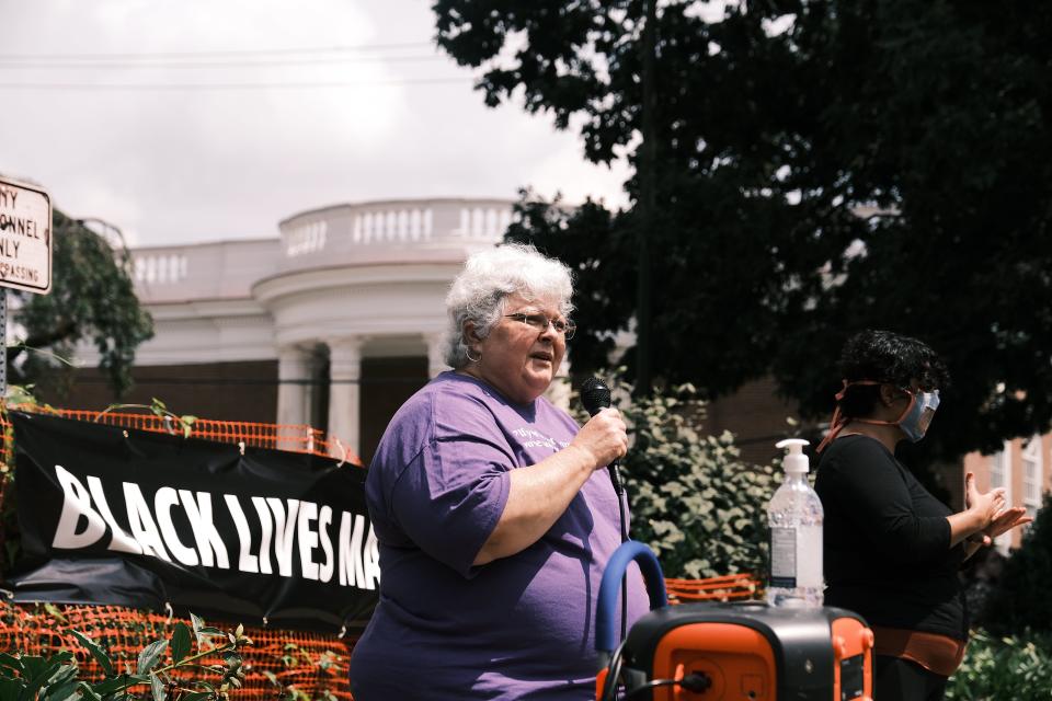 Susan Bro, the mother of Heather Heyer, addresses a crowd in Charlottesville, Virginia on 12 August, 2020. (Getty Images)