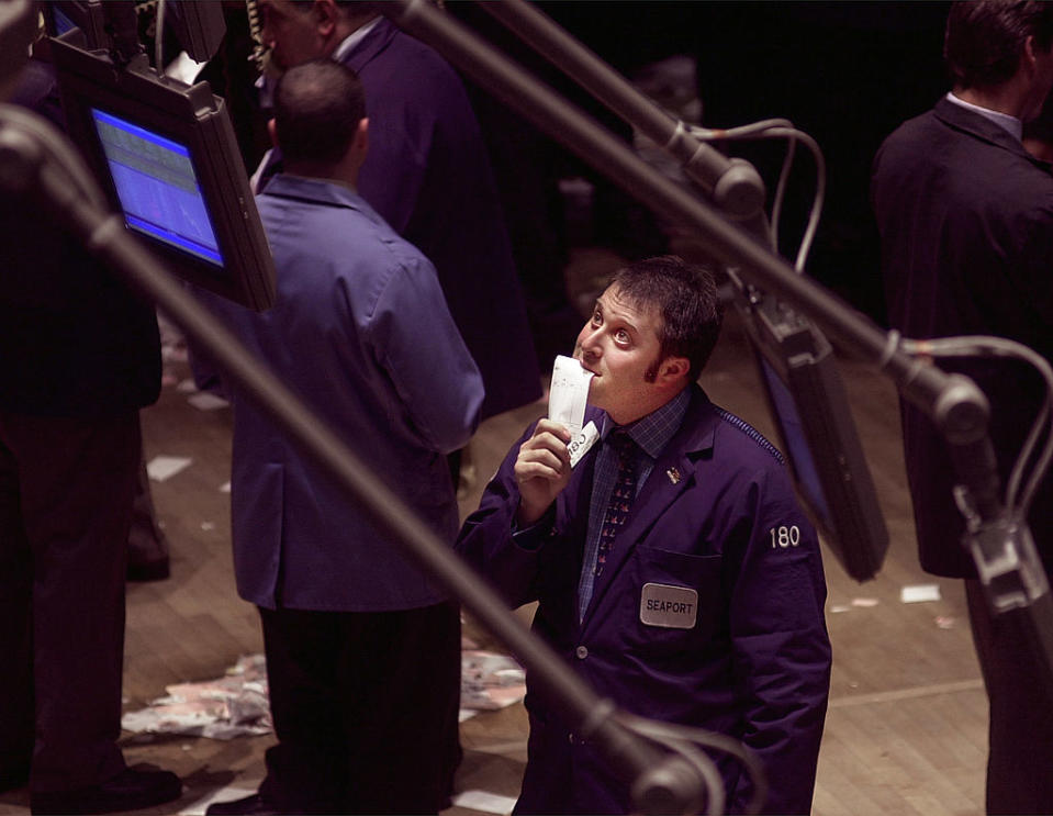 N367729 04: (MAGAZINES OUT) A trader looks at a monitor on the floor of the New York Stock Exchange in New York April 14, 2000. Stocks plummeted Friday in a broad sell-off as the Dow industrials fell over 600 points. (Photo by Chris Hondros/Newsmakers)