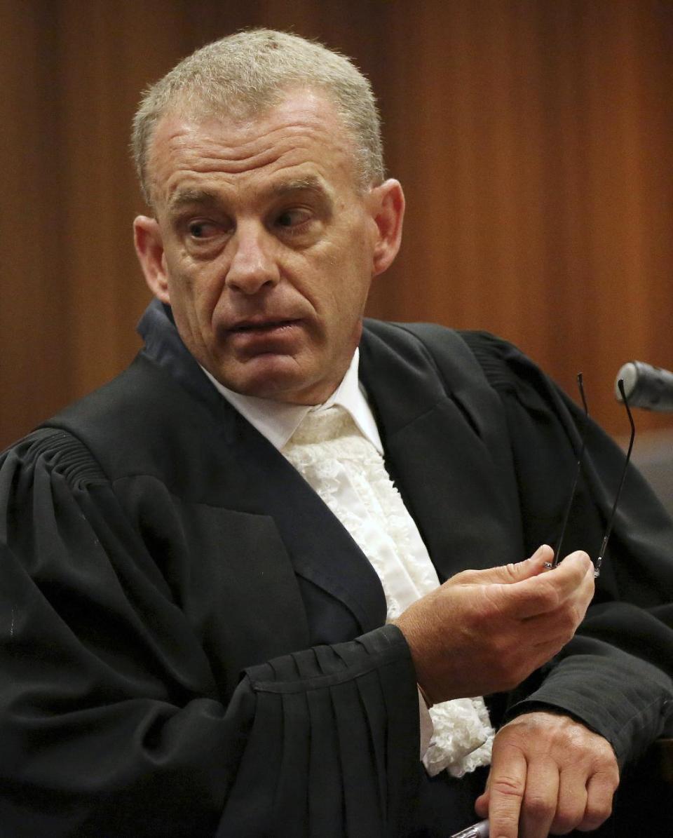 State prosecutor Gerrie Nel during cross questioning of Oscar Pistorius, in court in Pretoria, South Africa, Wednesday, April 9, 2014. Pistorius is charged with the murder of his girlfriend Reeva Steenkamp, on Valentines Day in 2013. (AP Photo/Siphiwe Sibeko, Pool)