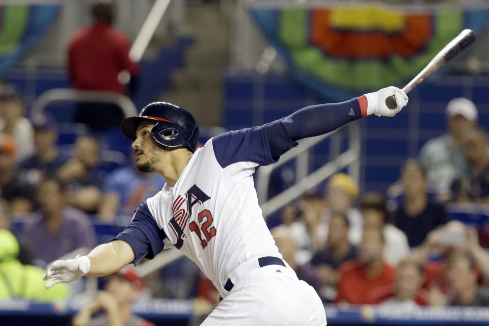 ARCHIVO - Nolan Arenado conecta un jonrón de tres carreras para Estados Unidos en el juego ante Canadá en la primera ronda del Clásico Mundial de Béisbol, el 12 de marzo de 2017. (AP Foto/Alan Díaz)