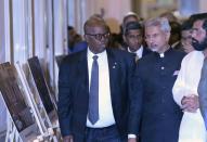 Foreign Minister of Gabon Michael Moussa-Adamo walks with Indian Foreign Minister S Jaishankar in the sidelines of a U.N. Counter-Terrorism Committee special meet in Mumbai, India, Friday, Oct. 28, 2022. The special meeting is being held in Mumbai, India’s financial and entertainment capital, that witnessed a massive terror attack in 2008 that left 140 Indian nationals and 26 citizens of 23 other countries dead by terrorists who had entered India from Pakistan. (AP Photo/Rajanish Kakade)