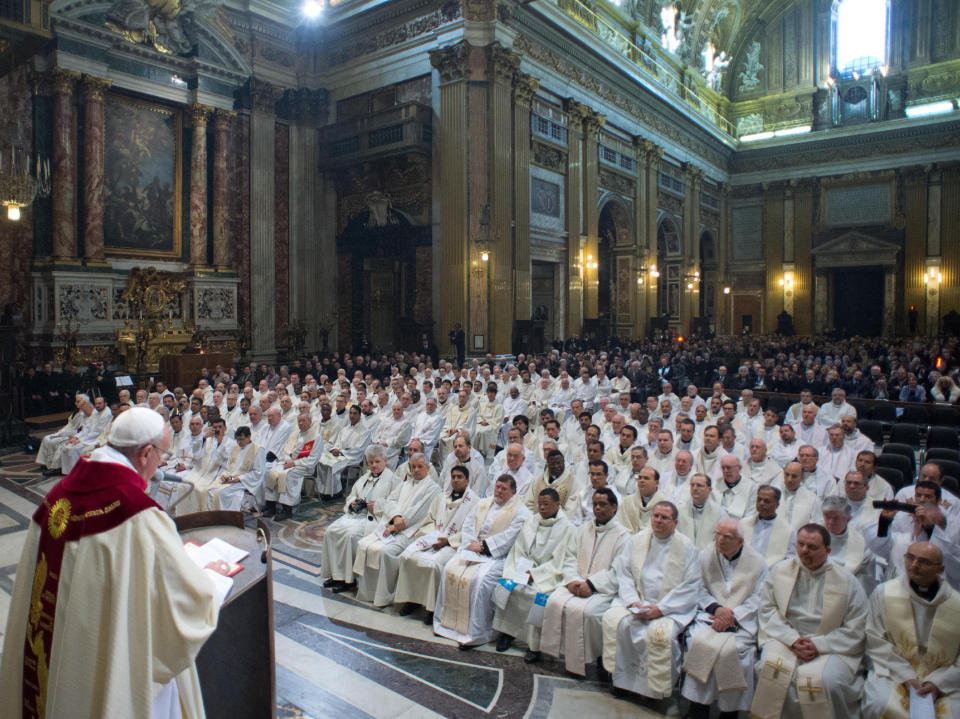 In this photo provided by the Vatican paper L'Osservatore Romano, Pope Francis celebrates a mass with the Jesuits on the occasion of the order's titular feast, in Rome's Jesus' Church, Friday, Jan. 3, 2014. (AP Photo/Osservatore Romano, ho)