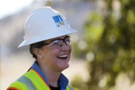 Pacific Gas and Electric CEO Patti Poppe is interviewed during a tour of PG&E workers burying power lines in Vacaville, Calif., Wednesday, Oct. 11, 2023. PG&E wants to bury many of its power lines in areas threatened by wildfires. (AP Photo/Jeff Chiu)