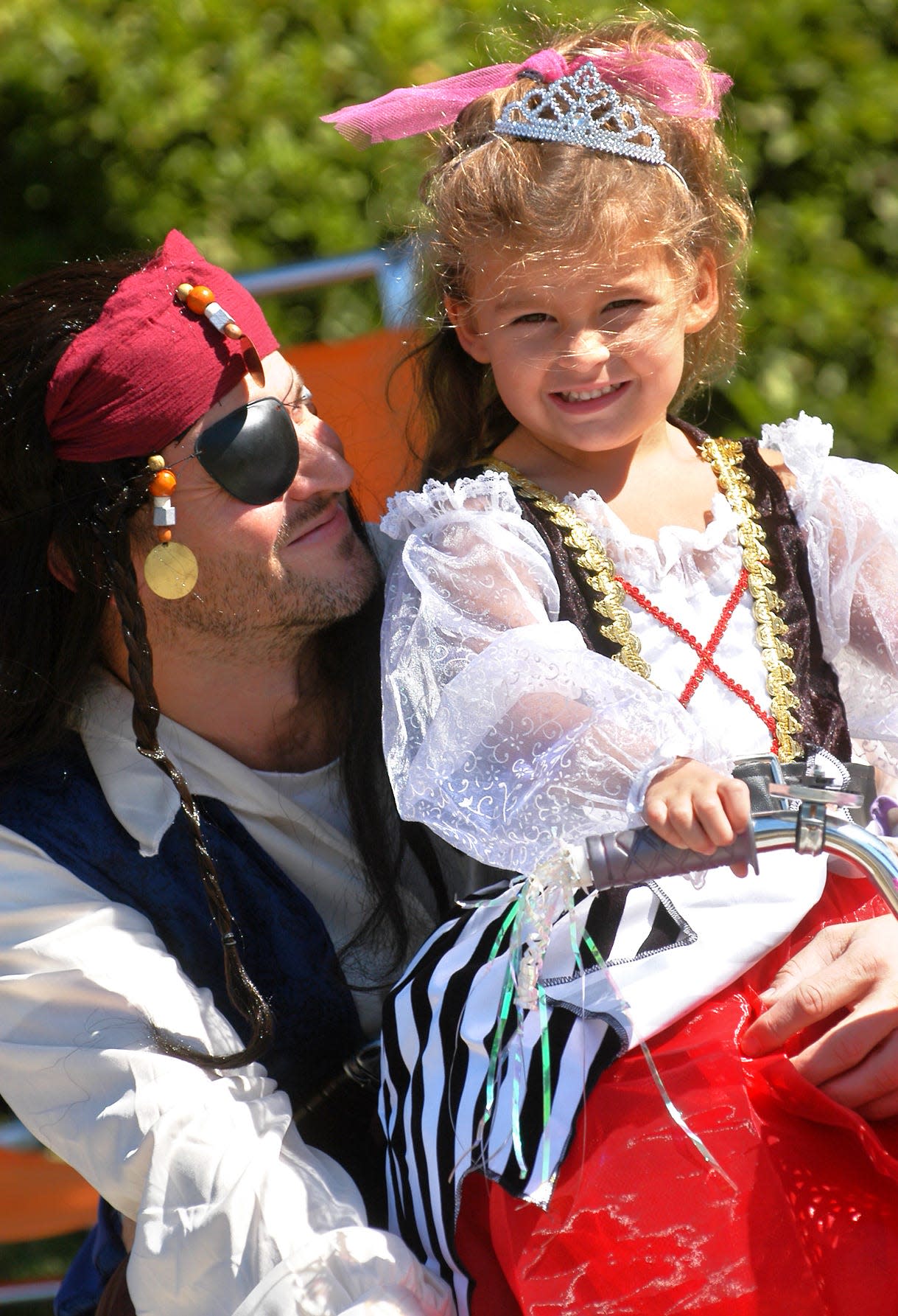 Stephen Nepa and his 4-year-old daughter Arabella Nepa dressed up as pirates and princesses Saturday for the Tybee Pirate Fest Parade.
