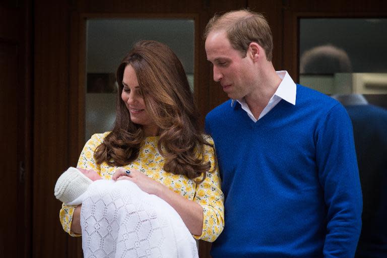 Britain's Prince William, Duke of Cambridge, and his wife Catherine, Duchess of Cambridge show their newly-born daughter, their second child, to the media outside the Lindo Wing at St Mary's Hospital in central London, on May 2, 2015