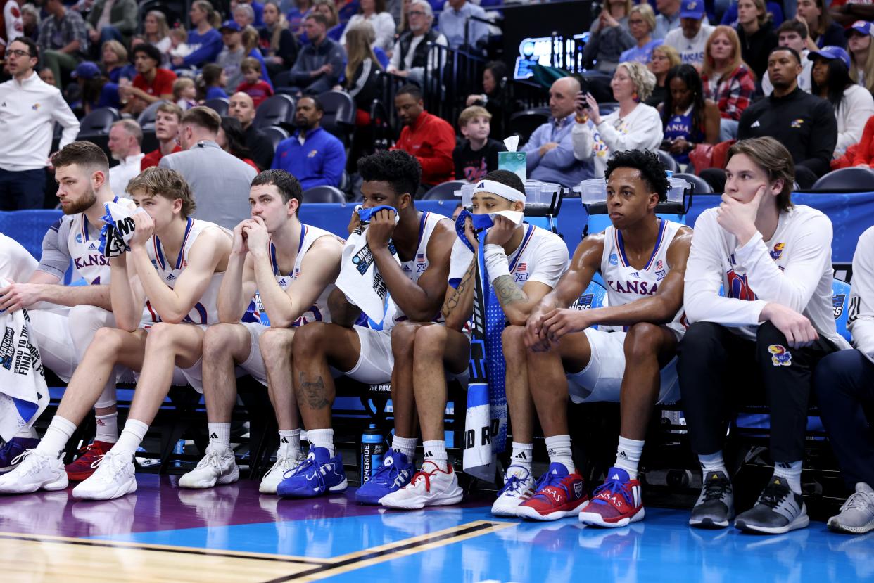 Kansas player sit on the bench during their loss to Gonzaga in the second round of the 2024 NCAA men's tournament at Vivint Smart Home Arena-Delta Center.