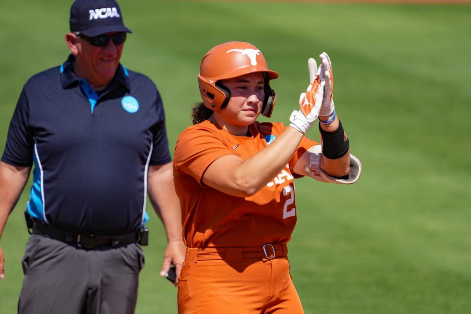 Texas freshman Katie Stewart claps after stealing second base during a win over Siena in last Friday's NCAA regional victory at McCombs Field. The Longhorns will host future SEC rival Texas A&M in a super regional this weekend.