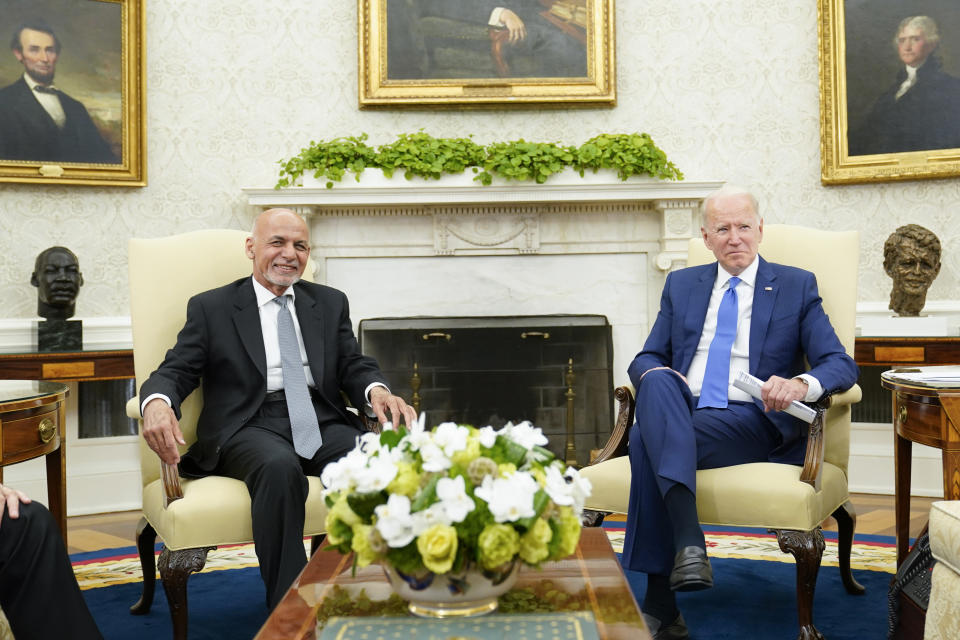 President Joe Biden, right, meets with Afghan President Ashraf Ghani, left, in the Oval Office of the White House in Washington, Friday, June 25, 2021. (AP Photo/Susan Walsh)