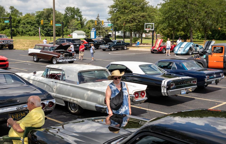 Over a dozen classic cars are parked near Heritage Park to celebrate the 175th anniversary of Taylor on Aug. 6, 2022.