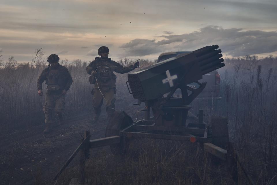 Two Ukrainian soldiers and a homemade mini-Multiple Launch Rocket System